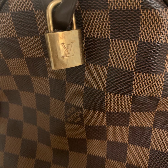 Damier Ebene Speedy 30 Louis Vuitton
Top Handle Bag
Includes Lock - Picture 2 of 6